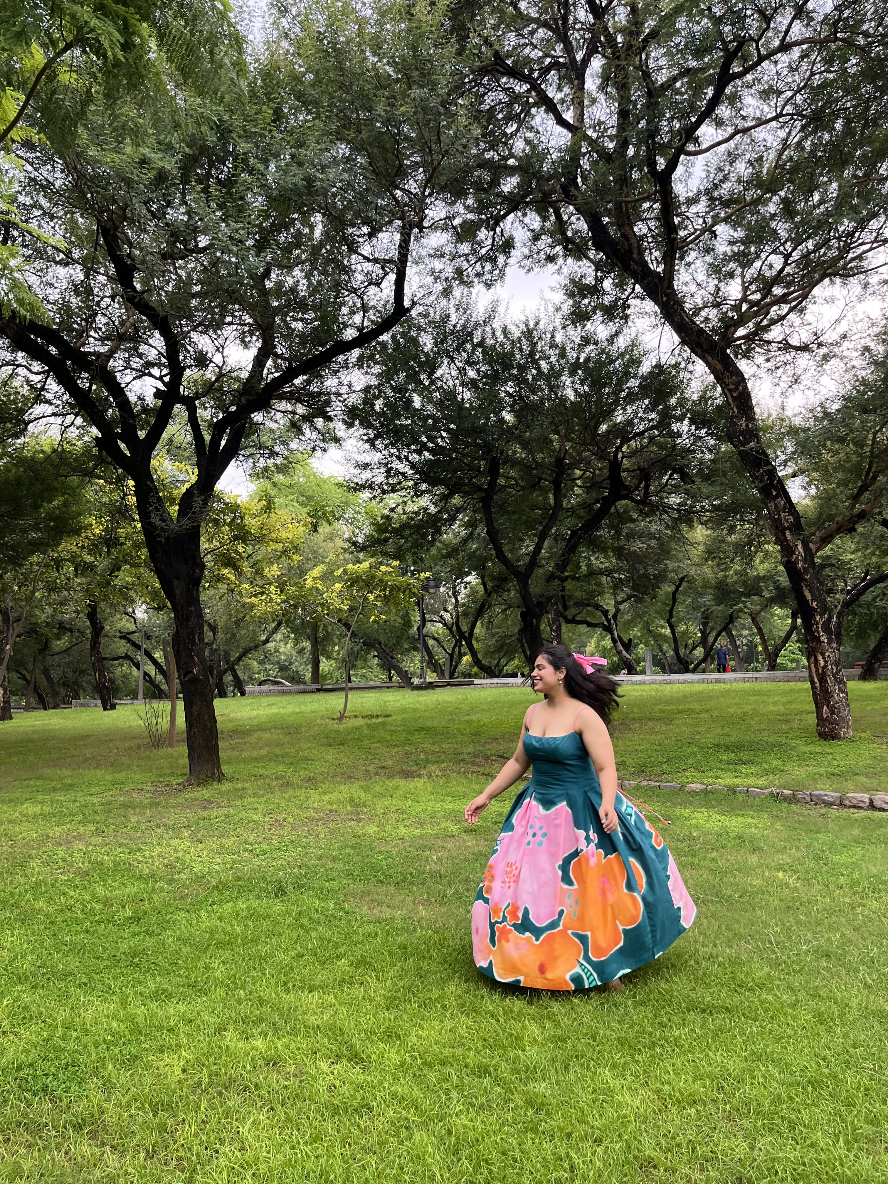 Woman in a Imsoo sustainable dress.
